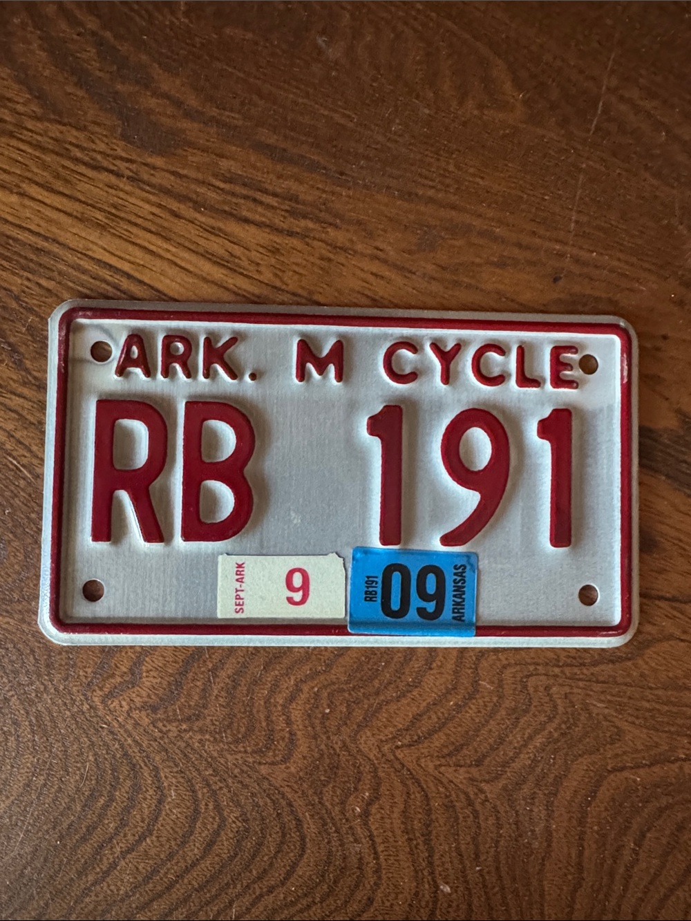 Vintage Arkansas Aluminum Motorcycle Plate RB 191 with ‘09 tabs
